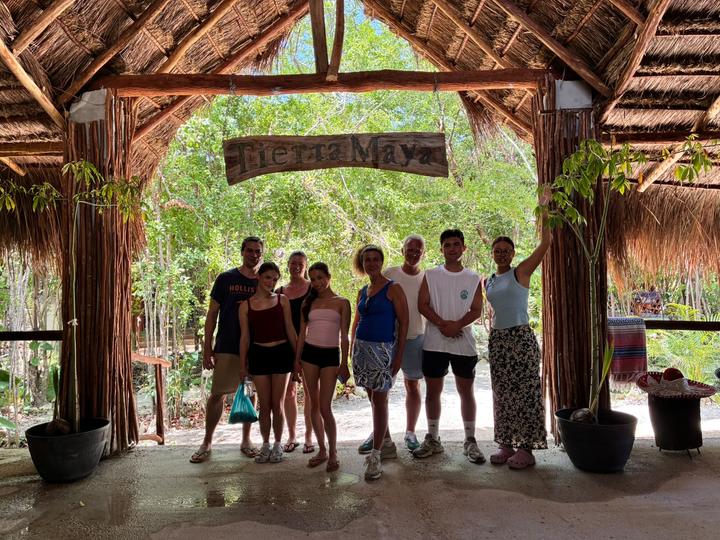 Group of nine at the entrance arch